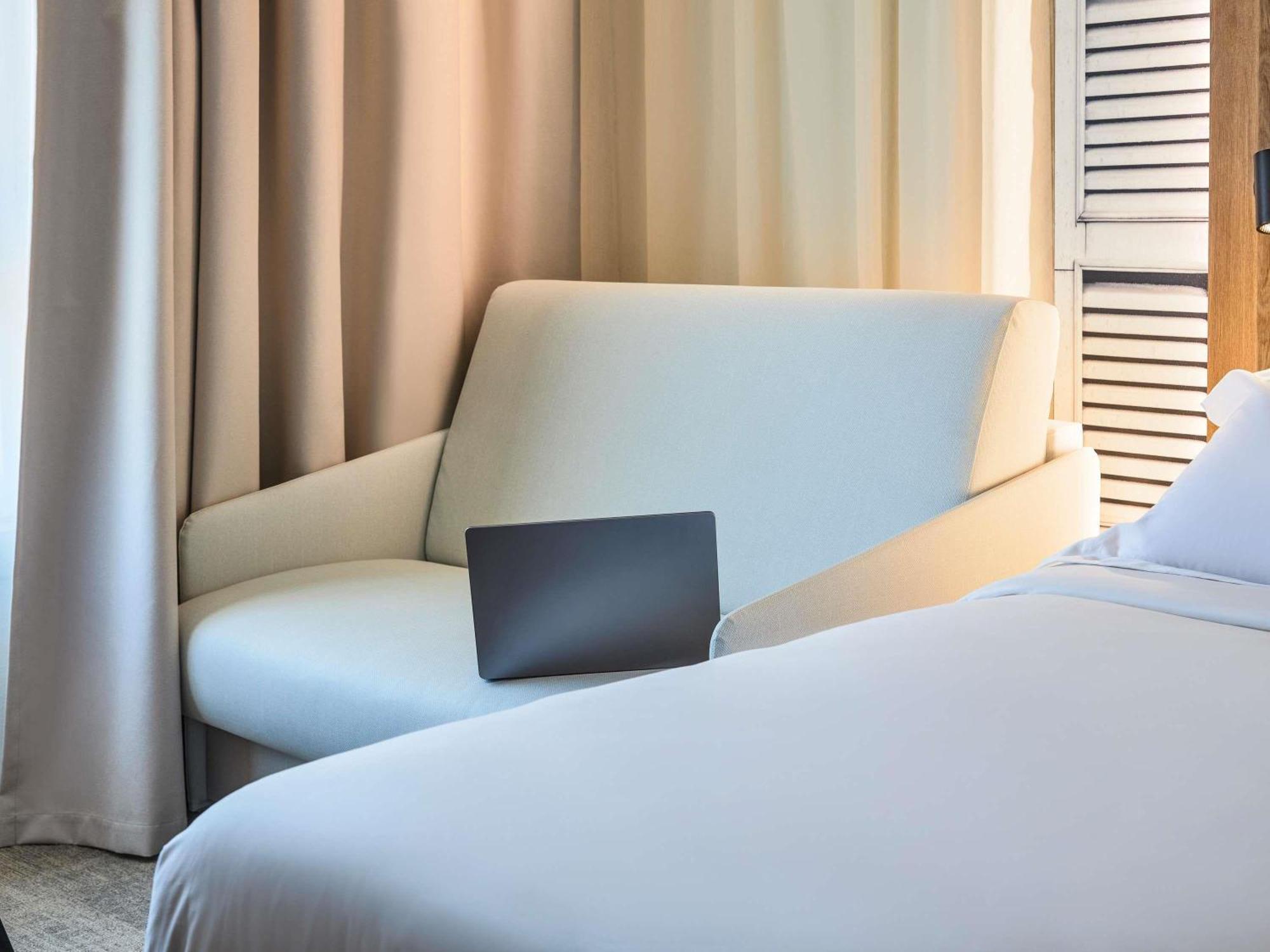 Camera Matrimoniale Classic con Divano-Letto